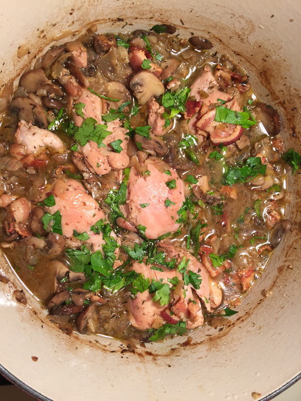 overhead shot of the pan with coq au vin in it