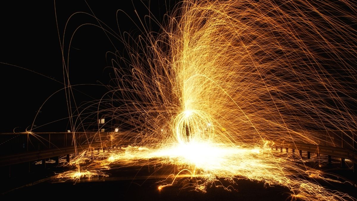 A bridge with fireworks on the surface